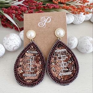 Plunder brand football earrings